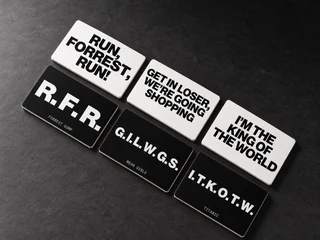 Three pairs of black initial cards and white answer cards